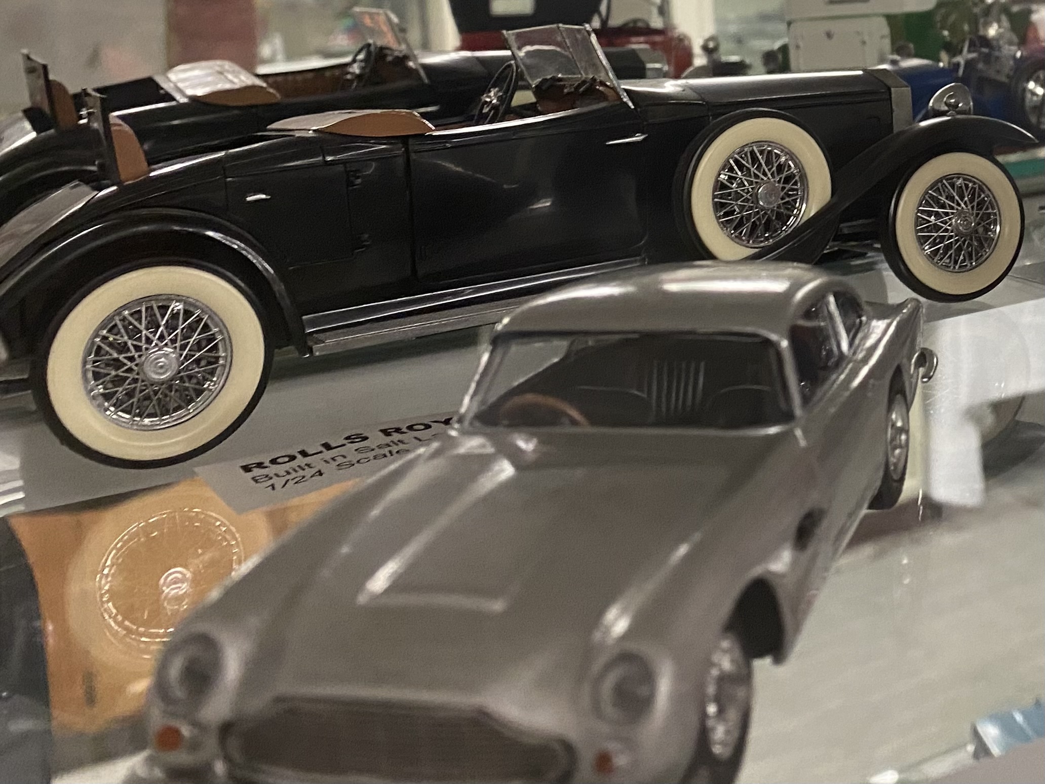 Museum exhibits scale models and superrealism paintings of local