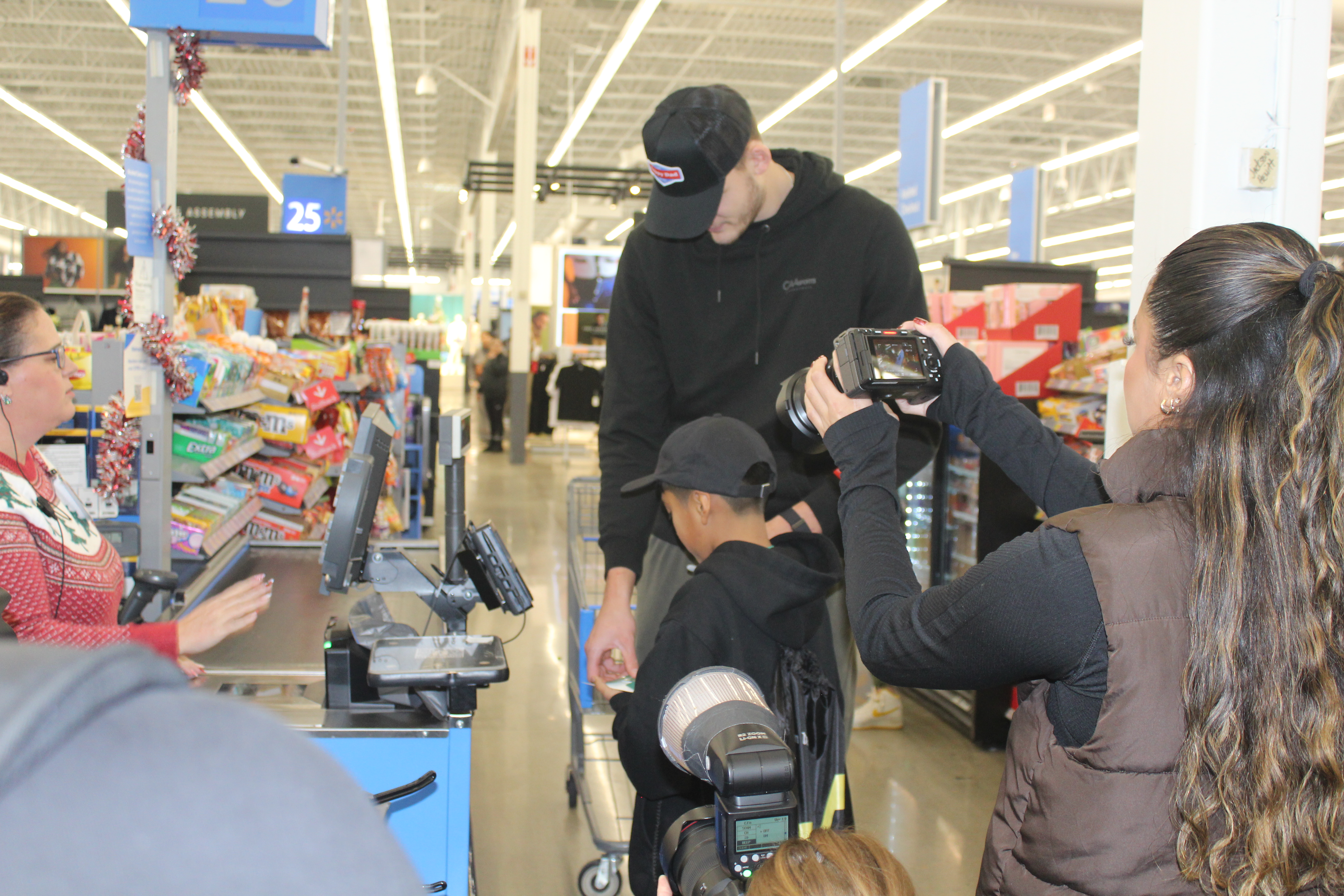 Jazz star Kessler takes kids on Walmart shopping spree | Midvale Journal