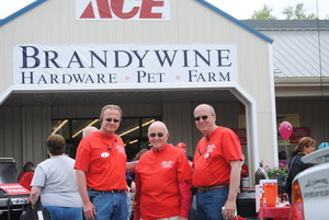 Owners Chris Drennen Larry Drennen Sr and Larry Drennen Jr celebrate the grand re-opening of Brandywine Ace Pet and Farm