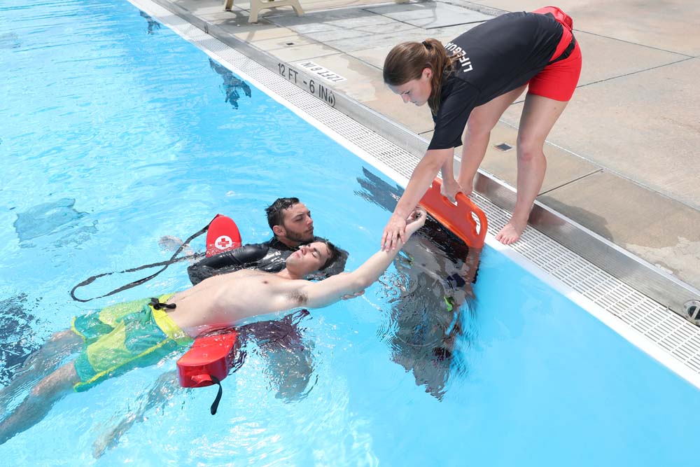 Lifequarding Pool Watching Over the Water: Lifeguards Earn Certification at Area Pools ...